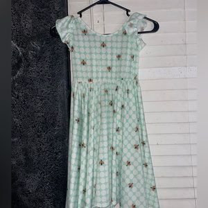 Green dress with bees